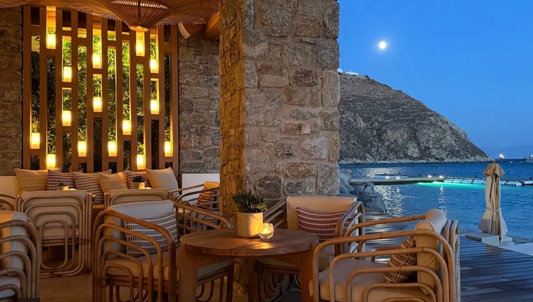 a table with chairs and a table with candles