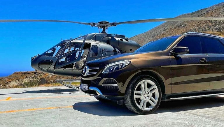 a car parked on a runway with a helicopter in the background
