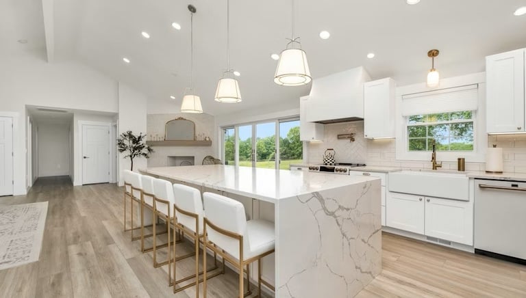 a kitchen with a marble counter top and a marble counter top