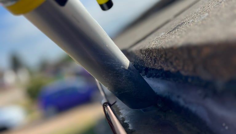 Vac gutter cleaning with an inspection camera
