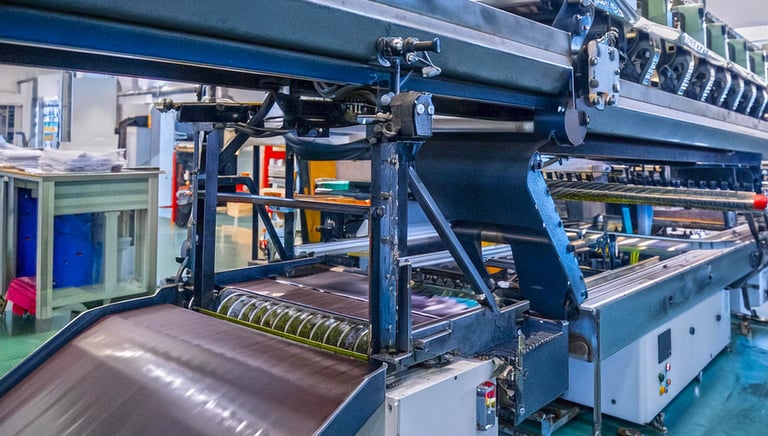 a slitting machine This process cuts the textile vertically by the size and the form so that it can 