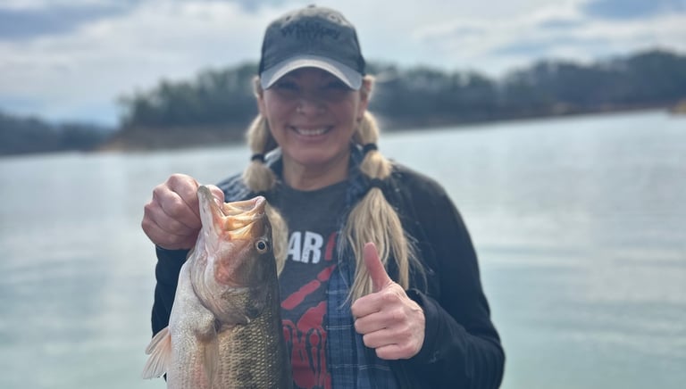 happy client holding a Huge fish