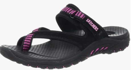 a woman's black and pink sandals with pink and white stripes