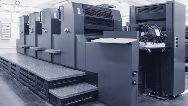 High-speed offset printer for large volume printing projects