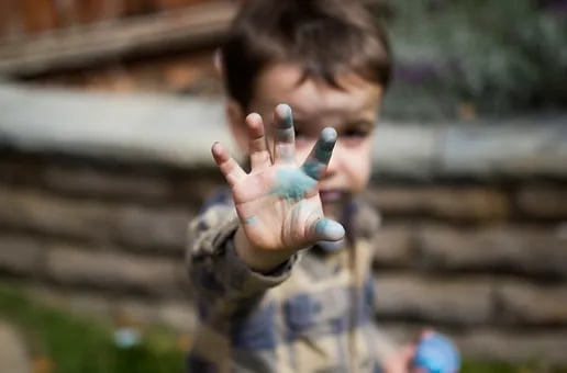 Toddler doing sensory play 