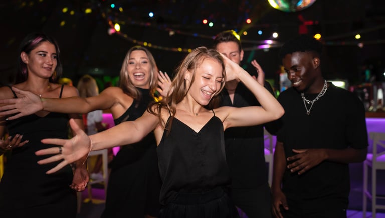 Group posing in 360 slow-motion video booth at Bakersfield birthday party