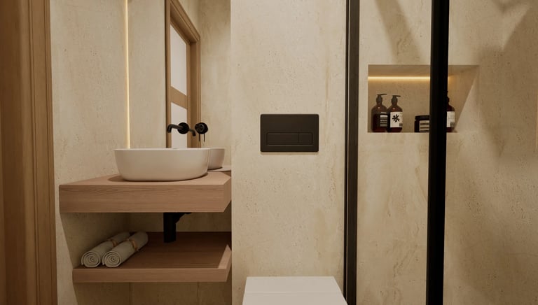 Baño moderno con lavabo sobre mueble de madera, ducha con perfilería negra y nicho iluminado.