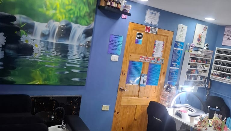 a salon and beauty salon with a large painting on the wall