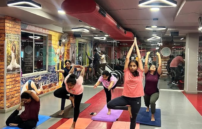 Spacious and modern group exercise studio at FitX1 Bangalore featuring high-energy Zumba and calming