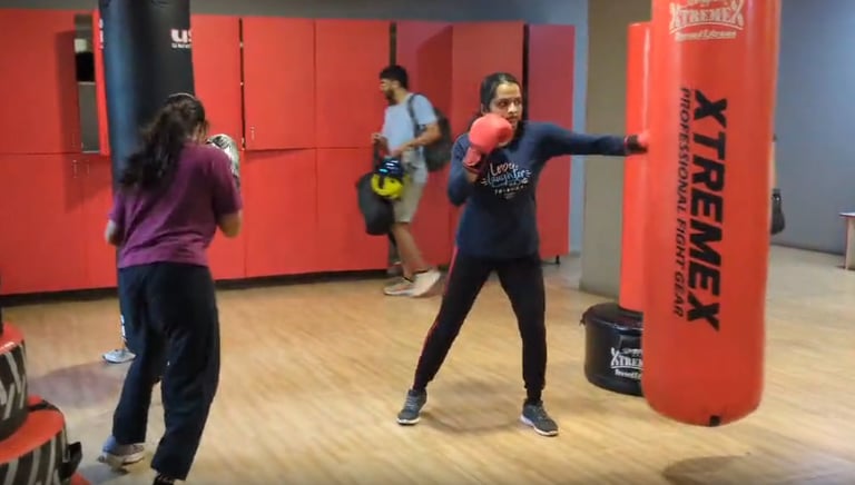 Professional Muay Thai and boxing training zone at FitX1 Bangalore for kids and adults.