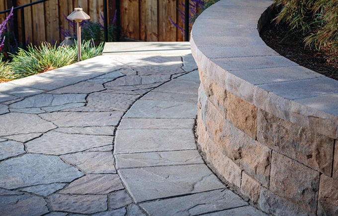 A Belgard stone paver walkway and retaining wall