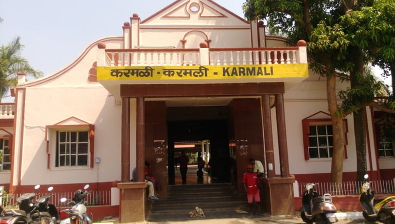 a building with a sign that says, Karmali Railway Station