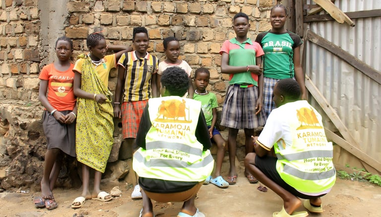 KTN staff engaging with the children in Katwe, Kampala.