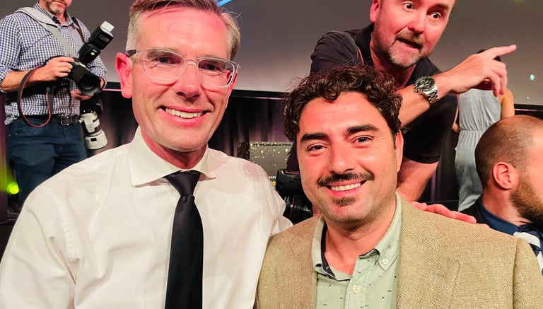 With Dominic Perrottet