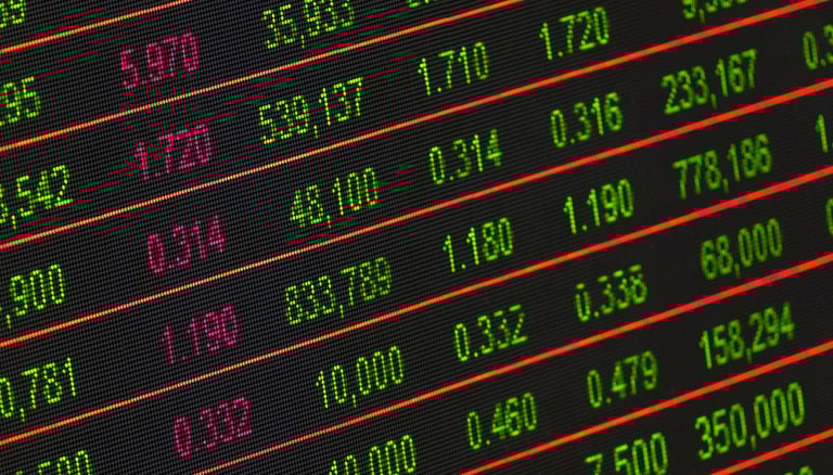 stock market investment numbers represent blog post about gold ira role in volatile markets