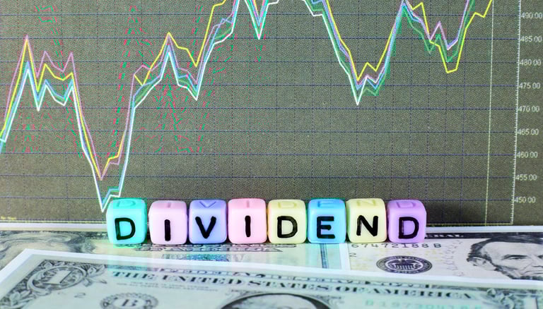 chart and dollar bills representing dividends