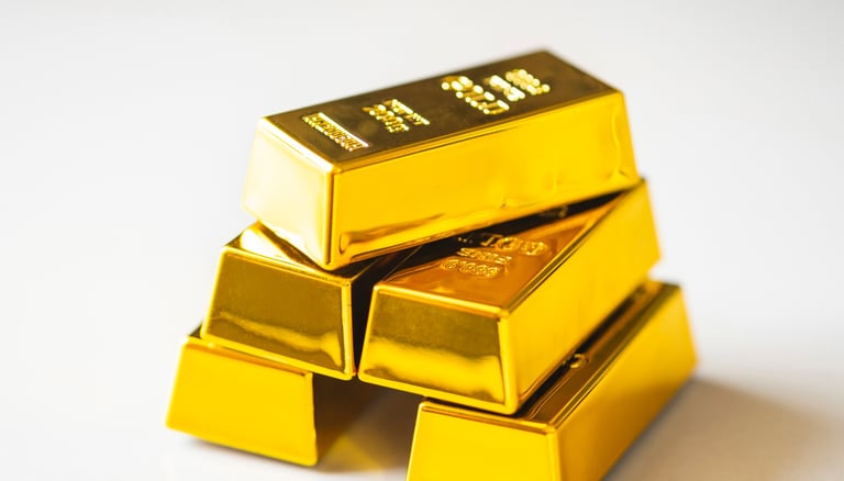 gold bullion bars in a pyramid
