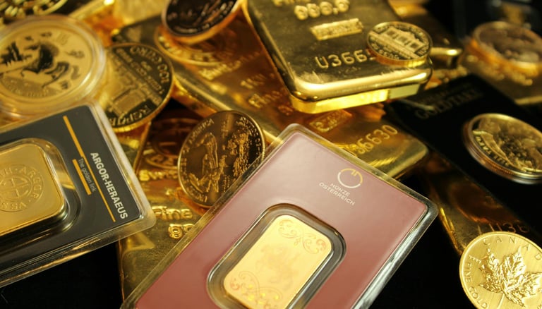 gold bars and coins representing long term potential of gold ira for retirement