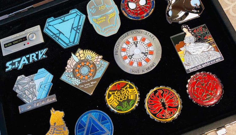 a black case with a variety of pins and badges