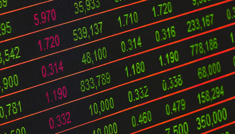 stock market investment numbers represent blog post about gold ira role in volatile markets