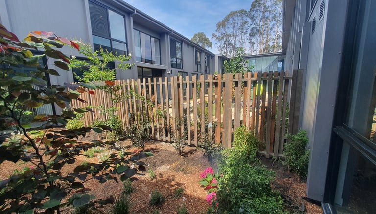 Recycled timber screen, made for plants to grow through.