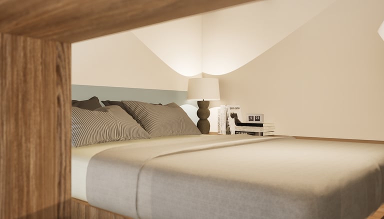 Chambre mezzanine aménagement T1 Lyon literie lampe chevet décoration moderne