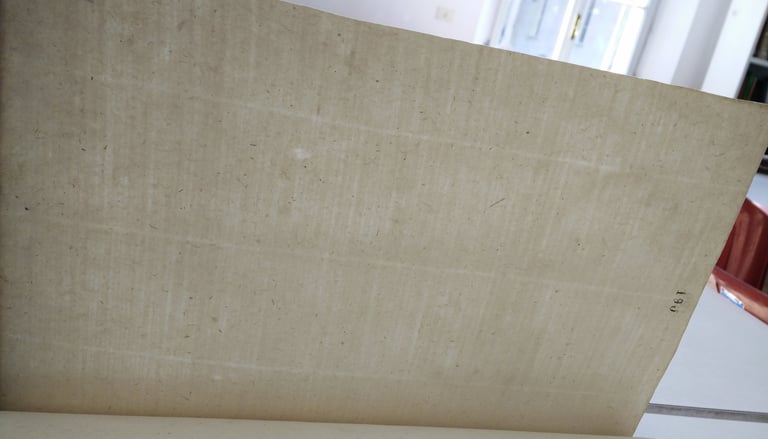 Markings from the wire sieve mould on a paper record from 14th century Parma.