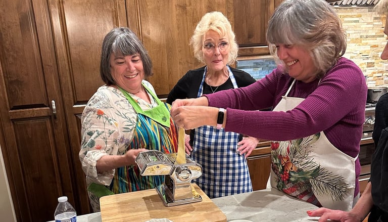 People having fun during pasta class
