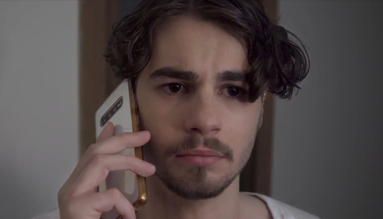 a man with a phone phone in his hand