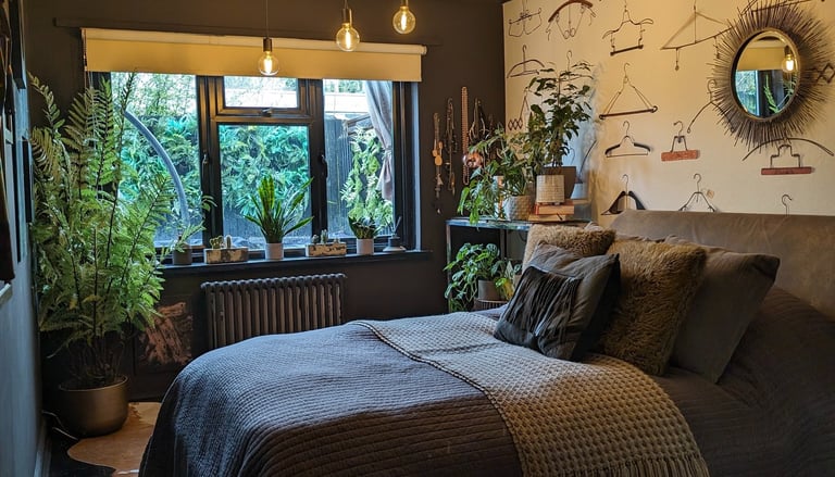a bedroom with a bed and a mirror and plants