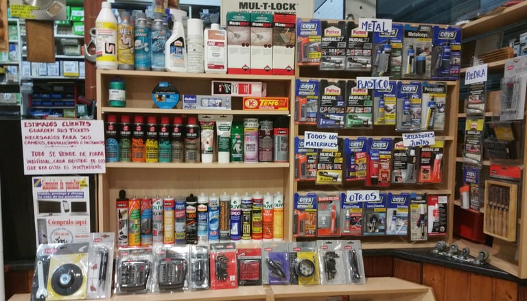 adhesivos, reparadores, selladores, lubricantes especiales y accesorios de herramientas manuales