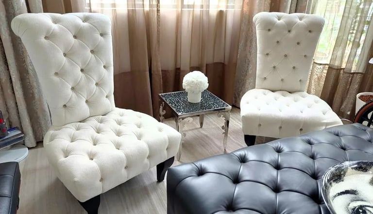 two white upholsteries in living room