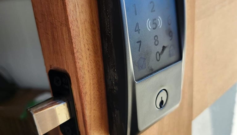Keypad smart lock installed on a wooden exterior door