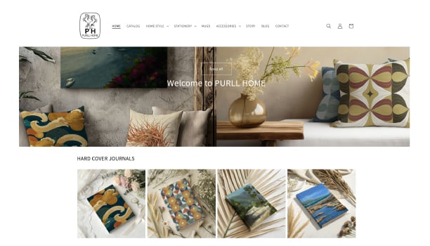PURL HOME website homepage featuring designer throw pillows and hardcover journals with artistic patterns.