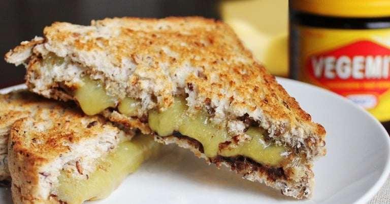 a sandwich with cheese and vegemite on it. Australian vegemite 