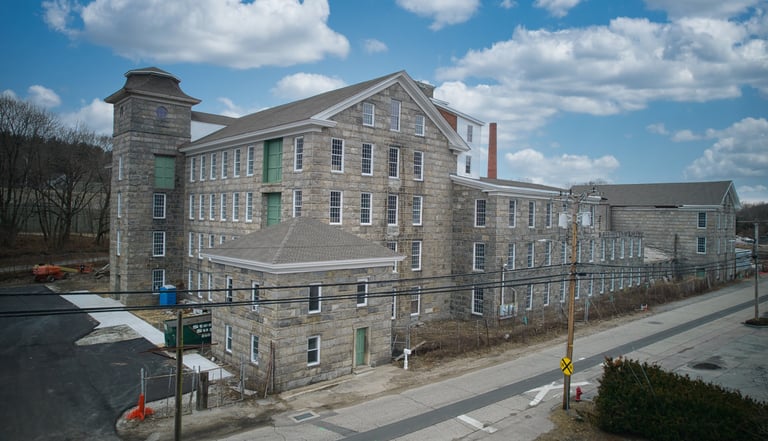 a large building with a clock tower in the middle of it