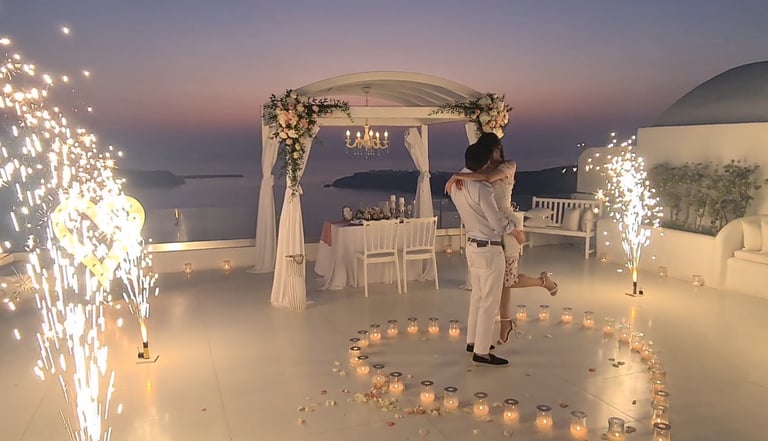 Memorable Santorini proposal marked by elegant stage fireworks under the stars.