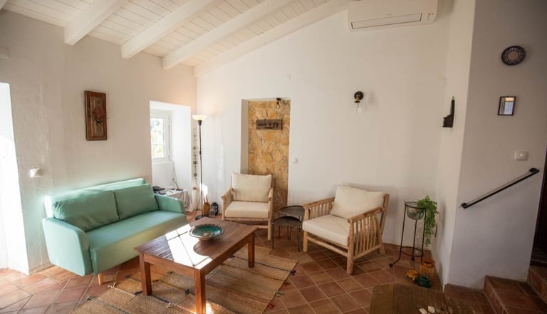 a living room with a couch and a table