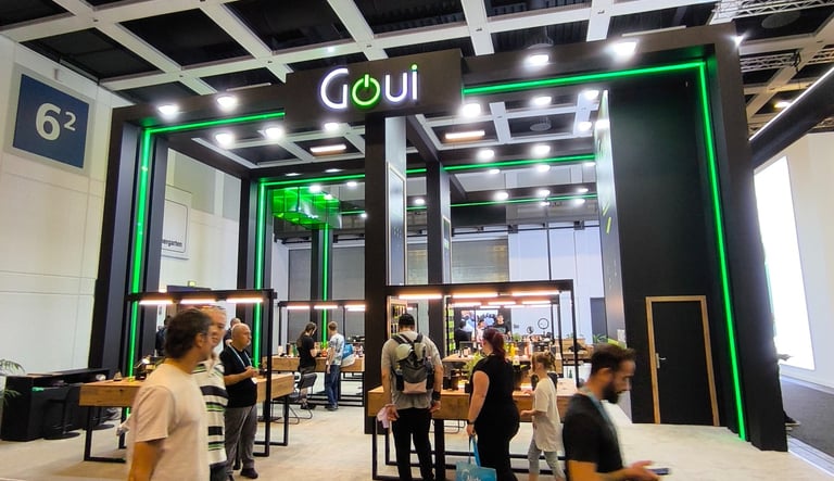 Modern high-tech pavilion featuring vibrant green LED accents and spacious interactive zones.