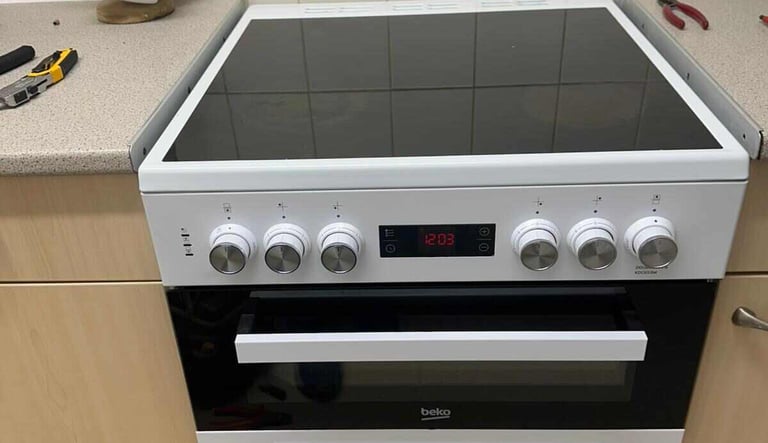 Electric Cooker Installation In Kitchen