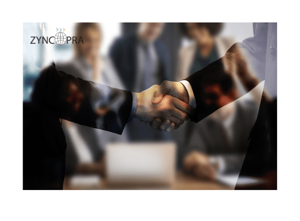 Professional handshake symbolizing trust-based distributor partnerships with Zyncopra.