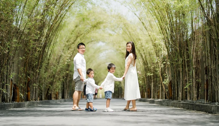 Family walking together during a relaxed family photography session at W Bali Seminyak