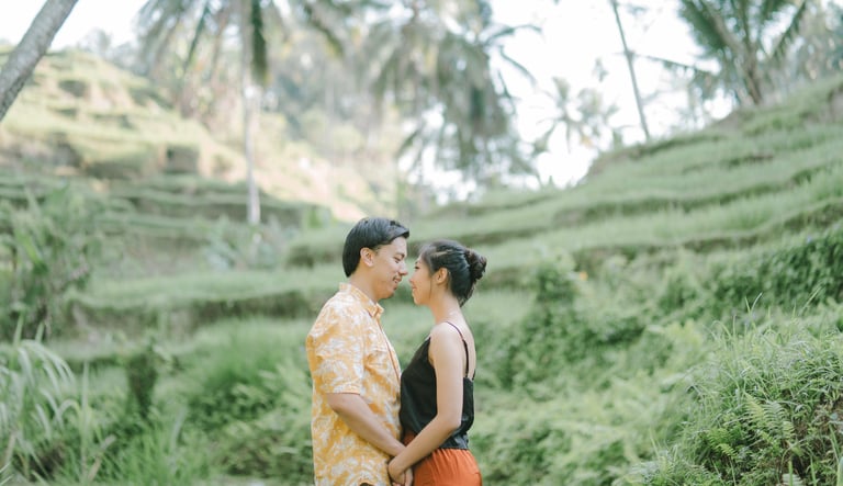 Intimate couple portrait at Tegalalang rice terrace Ubud Bali during sunrise.
