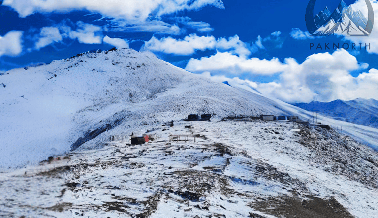 Babysar top scene with Himalayan mountains range in the background