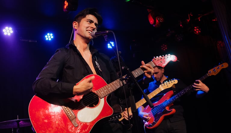 Brighton UK wedding and events singer Olly Williams performing live with guitar