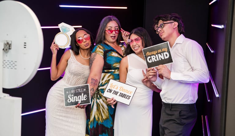 Vogue LED photo booth setup with neon lights at Sweet 16 party