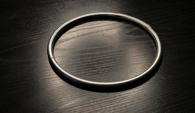 Girdle Hoop (Shock absorber ring placed in a dark background. Ring placed in a dark background