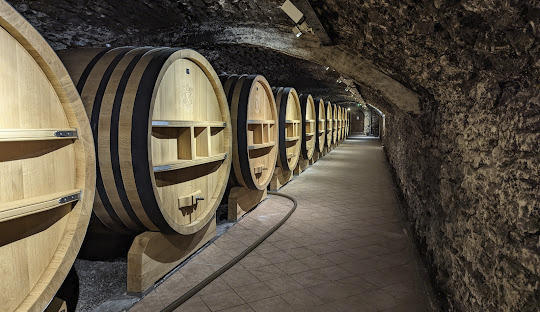 Wine cellar with big wooden oak barrels Provence