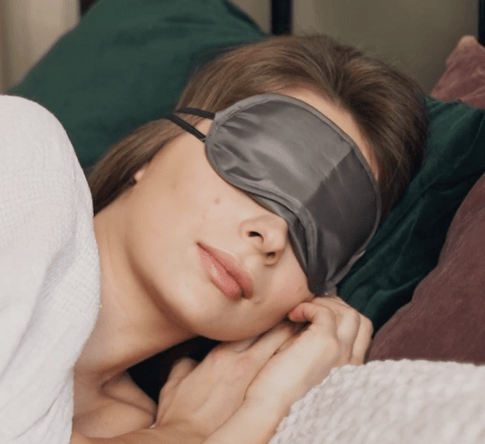 sleeping woman with blinders on