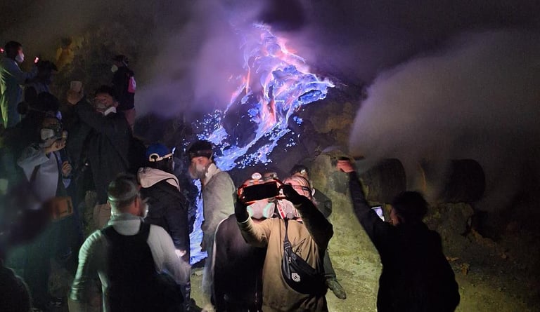 Hiker at Blue Fire at Mt. Ijen Crater